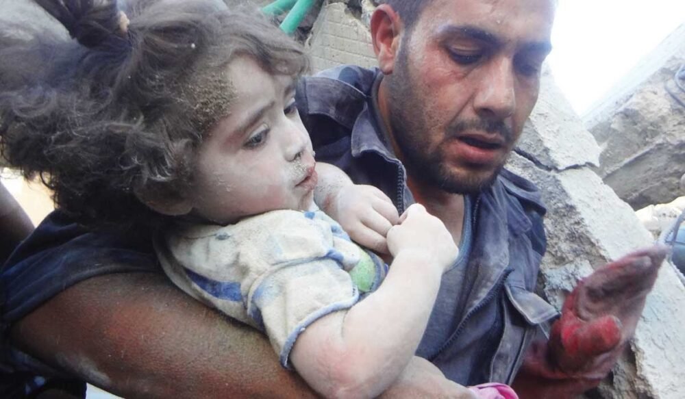 Child pulled from rubble in Syria