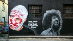 Mural of 'Blindboy' and Luke Kelly painted on the walls of Hangar nightclub in St Andrew's Lane by Subset